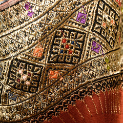 Thai Silk golden fabric pattern woven hand craft.