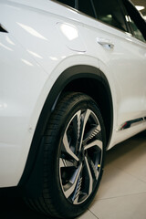 rear wheel of a white car