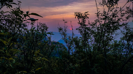 Naklejka premium beautiful scenery of sunrise from top of the mountain.