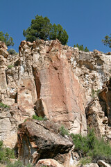 Fototapeta na wymiar Petroglyphs on stone wall in desert landscape, Fremont State Park, Utah, USA