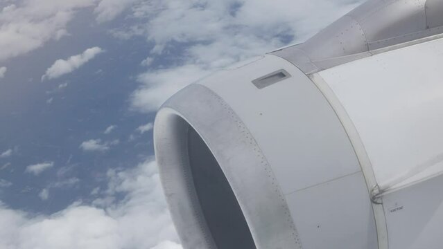 View from in side plane cabin through plane window see plane's engine