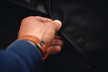 Stock photo of a black suit with a place for an inscription