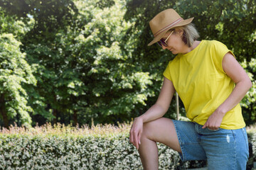 Blonde woman, Spontaneous summer portrait on a walk in the park