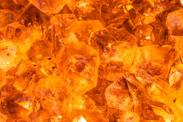 Golden crystal mineral stone. Gems. Mineral crystals in the natural environment. Texture of...