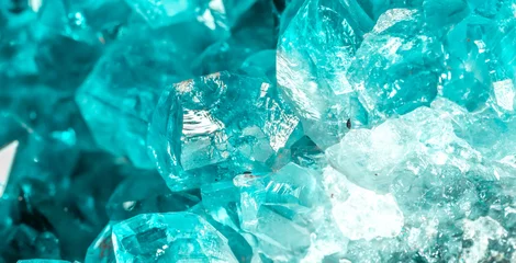 Tuinposter Aquamarine crystal mineral stone. Gems. Mineral crystals in the natural environment. Texture of precious and semiprecious stones. shiny surface of precious stone © Vera