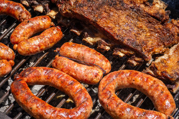 Typical gaucho barbecue with ribs and sausages in the countryside