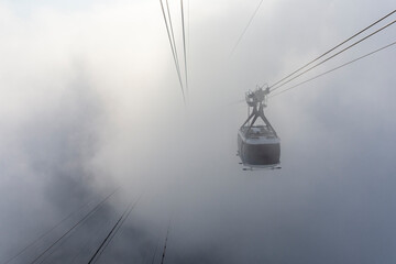 Beautiful view to Sugar Loaf Mountain cable car above the clouds