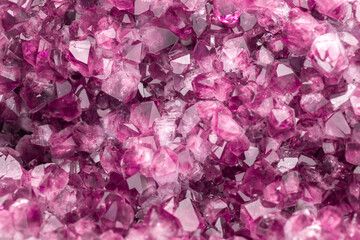 Amethyst pink crystals. Gems. Mineral crystals in the natural environment. Texture of precious and...