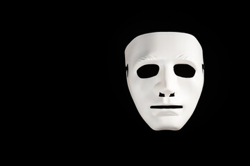 White mask on a black background, theatrical face, monochrome drama, stage art, festival celebration