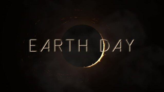 A captivating black and white image of a full moon encircled by a luminous ring, accompanied by the words Earth Day in white