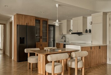 A Modern Kitchen featuring a Refrigerator in a Wooden Frame
