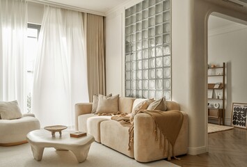 The living room boasts a pristine ambiance with a centerpiece— a stylish white sofa that exudes...