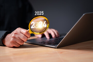 Magnifying glass in 2024, the business meticulously examines opportunities for success, forecasting financial growth, increased income, and higher profits a strategic vision for a prosperous future.