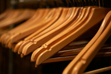 A row of hangers without clothes