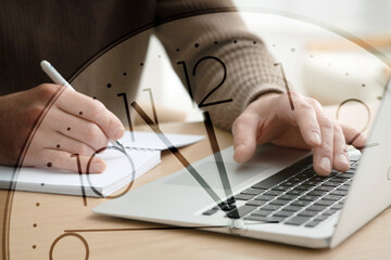 Time concept. Double exposure of man using laptop while taking notes and clock
