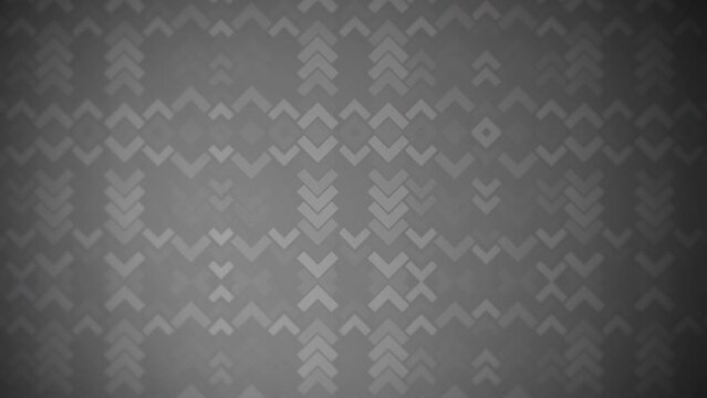 A black and white, diagonal pattern of small triangles arranged in a zigzag pattern creates a mesmerizing geometric design. Complexity and repetition give the image an intriguing visual appeal