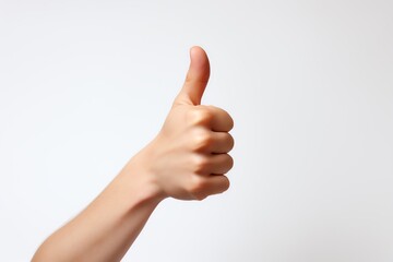 a hand giving a thumbs up - obrazy, fototapety, plakaty