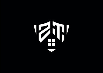 Real estate letter ZT shield shape logo and house building vector template