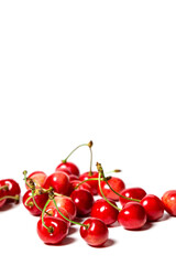 Fresh red cherry berries on a white background, berries for dessert