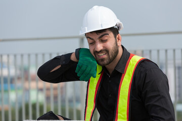 Foreman construction builder tired and thirst of water at construction site