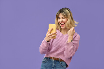 Excited crazy gen z blonde young woman winner with smartphone, happy shopper customer student girl...
