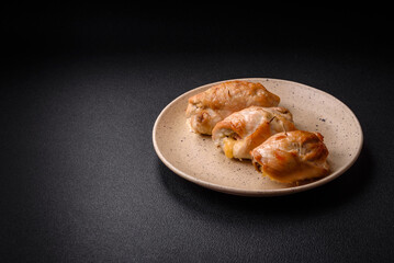 Delicious fresh meat roll made from chicken fillet, mushrooms, spices and herbs