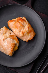 Delicious fresh meat roll made from chicken fillet, mushrooms, spices and herbs