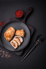 Delicious fresh meat roll made from chicken fillet, mushrooms, spices and herbs