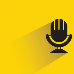 microphone icon with shadow on yellow background