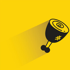 chicken drumstick with shadow on yellow background