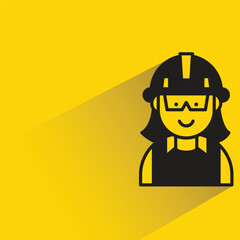 girl engineer with shadow on yellow background