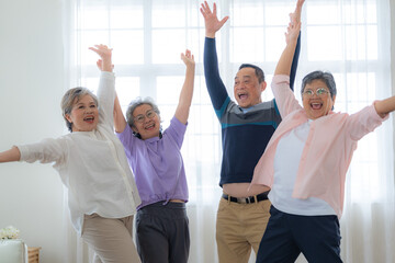 Group of Senior Retirement Friends Happiness Concept. Elderly people put hands together and cheer...