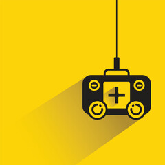 game joystick icon with shadow on yellow background