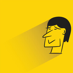 sad man with shadow on yellow background