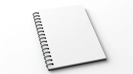Foto auf Acrylglas a spiral bound notebook with a white cover © Tatiana