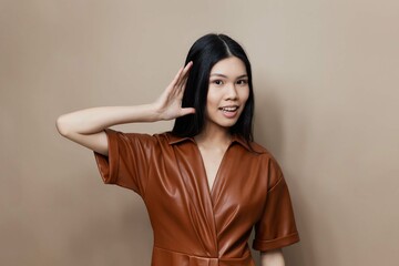Fototapeta premium Woman beige glamour beautiful femininity beauty cosmetic fashion hair portrait asian model