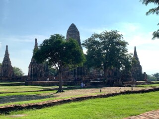 archaeological site temple country, Ancient stupas, pagodas, lots of orange bricks lined up. Temples within the ancient city of Ayutthaya in blue sky day