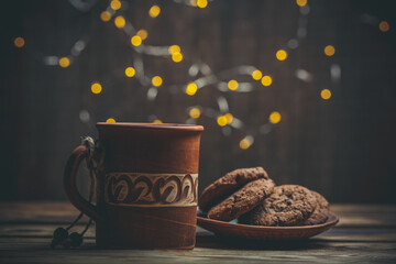 New Year's sweets with coffee and mulled wine, chocolate cookies and hot drinks on New Year's Eve