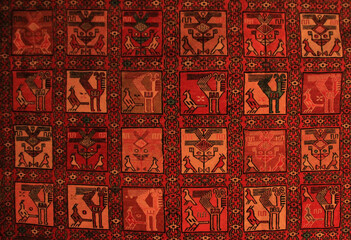 Urartian figures on silk carpet