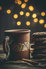 New Year's sweets with coffee and mulled wine, chocolate cookies and hot drinks on New Year's Eve