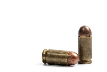 Firearms bullets on a white background, 9mm pistol cartridge