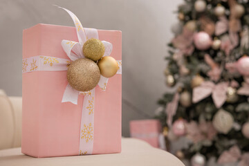 Christmas tree and gifts on a background. - 693901487