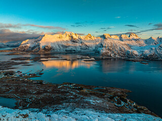 View by drone of Lofoten Island during sunset, Winter Snow time in Norway