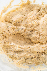 Lemon poppy seed muffins garnished with almond slivers