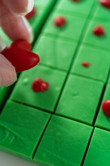 Green fudge with red hearts