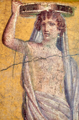 Figure of a woman painted in a Fresco in a Domus of Pompeii, the ancient Roman city of Pompeii, a UNESCO heritage site, destroyed by the eruption of the Vesuvius in 79 BC - 693906078