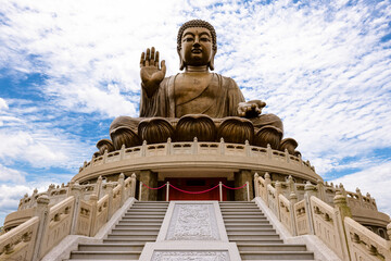 The Big Buddha located at Ngong Ping, Lantau Island, in Hong Kong. - obrazy, fototapety, plakaty