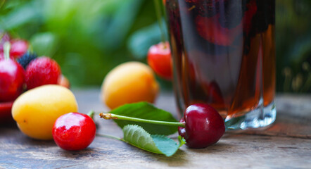 Juice and various fruits on the board