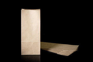 Set of paper bags for shopping on black background. Mockup for design