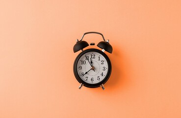 White retro alarm clock isolated on background with copy space